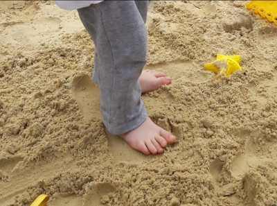 Barfuß im Sand